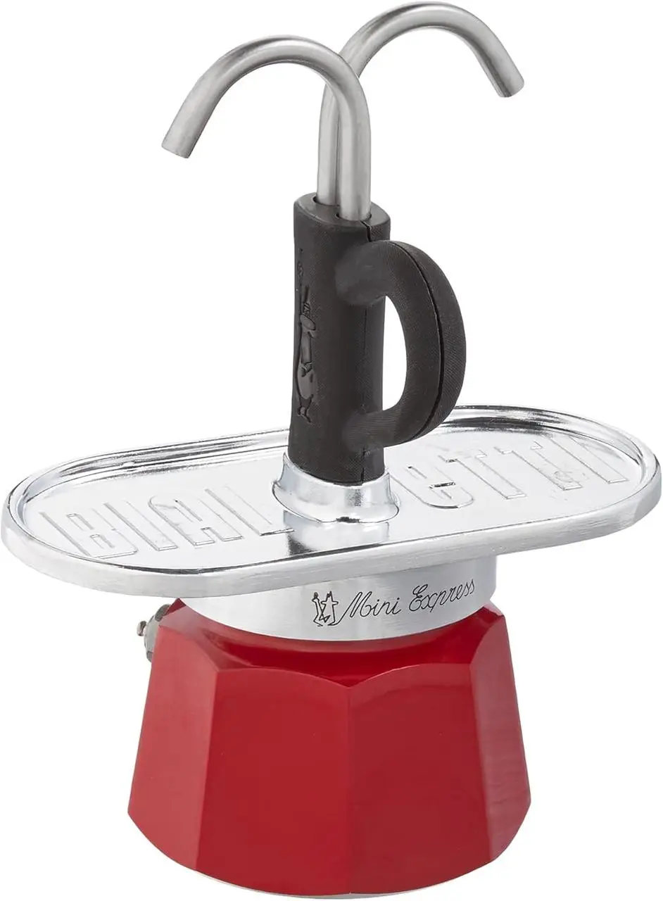 Купити Гейзерна кавоварка Bialetti Mini Express Magritte 80 мл з 2 чашками Гейзерна кавоварка Bialetti Mini Express Magritte 80 мл з 2 чашками